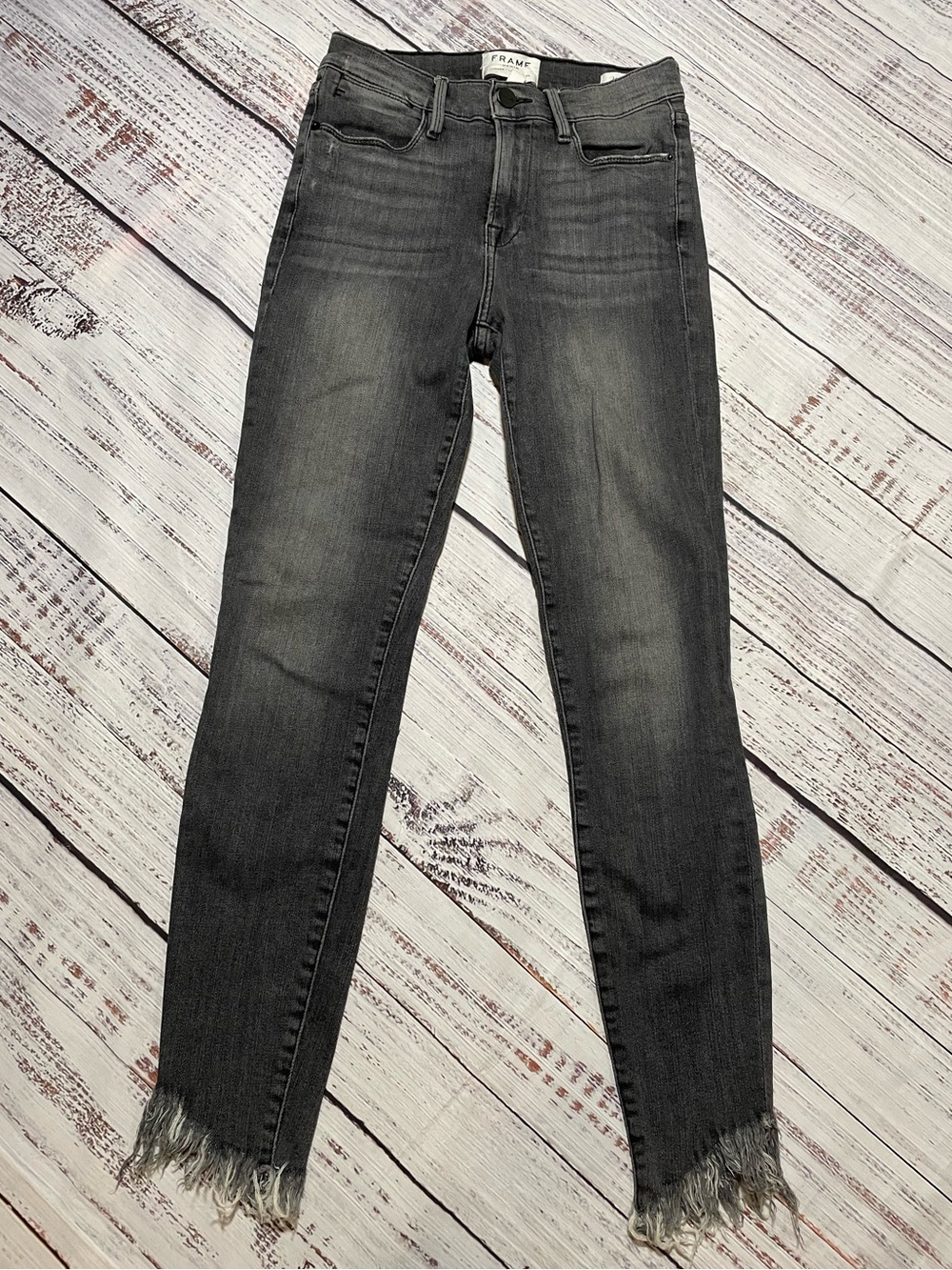 FRAME Le High Skinny Jeans in washed gray. Size 25